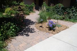 Tumbled paver front entrance walk.